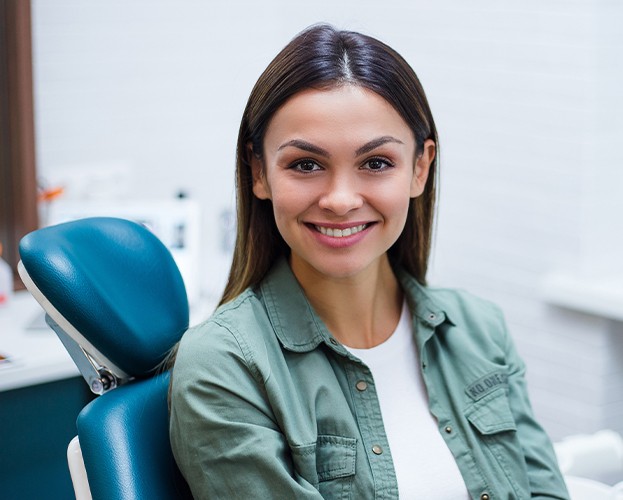 Smiling woman in dental chair