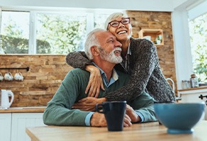 Dentures patient in West Seneca talking with partner