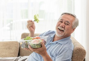 Dentures patient in West Seneca eating