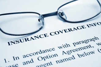 insurance form with glasses on it 