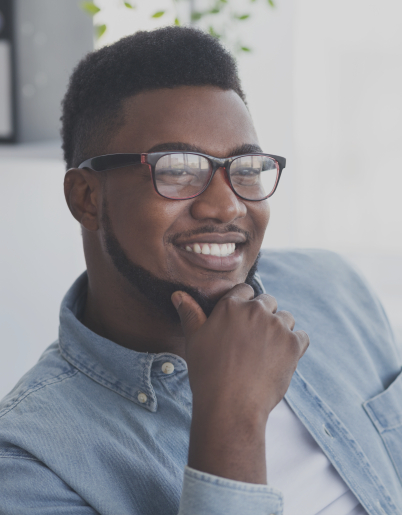 Young man resting his hand on his chin