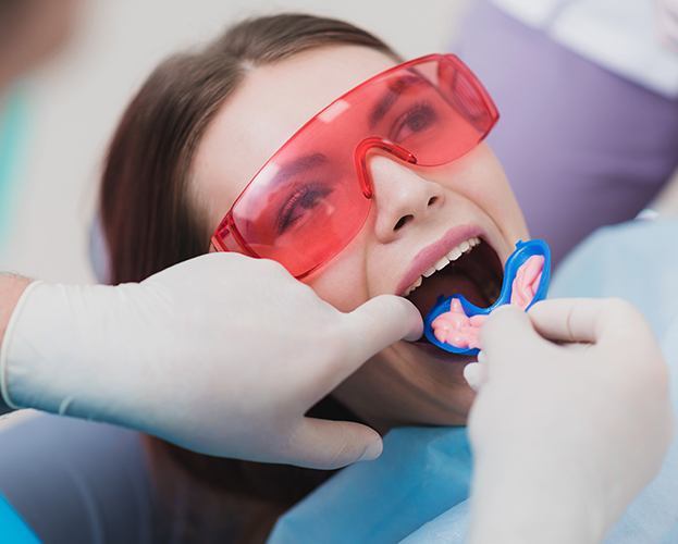 Patient receiving fluoride treatment