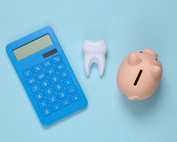 calculator, tooth, and piggy bank