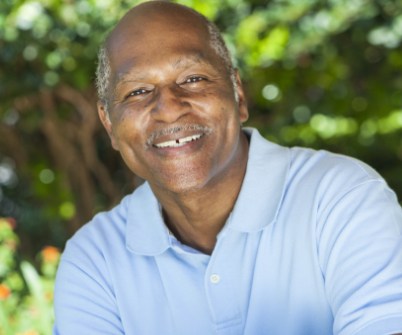 Older man with health smile after dentistry for seniors