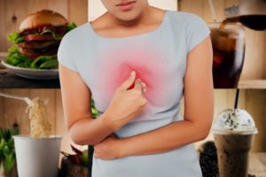 woman with heartburn