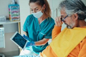 patient getting answers about whether extracting teeth fixes gum disease